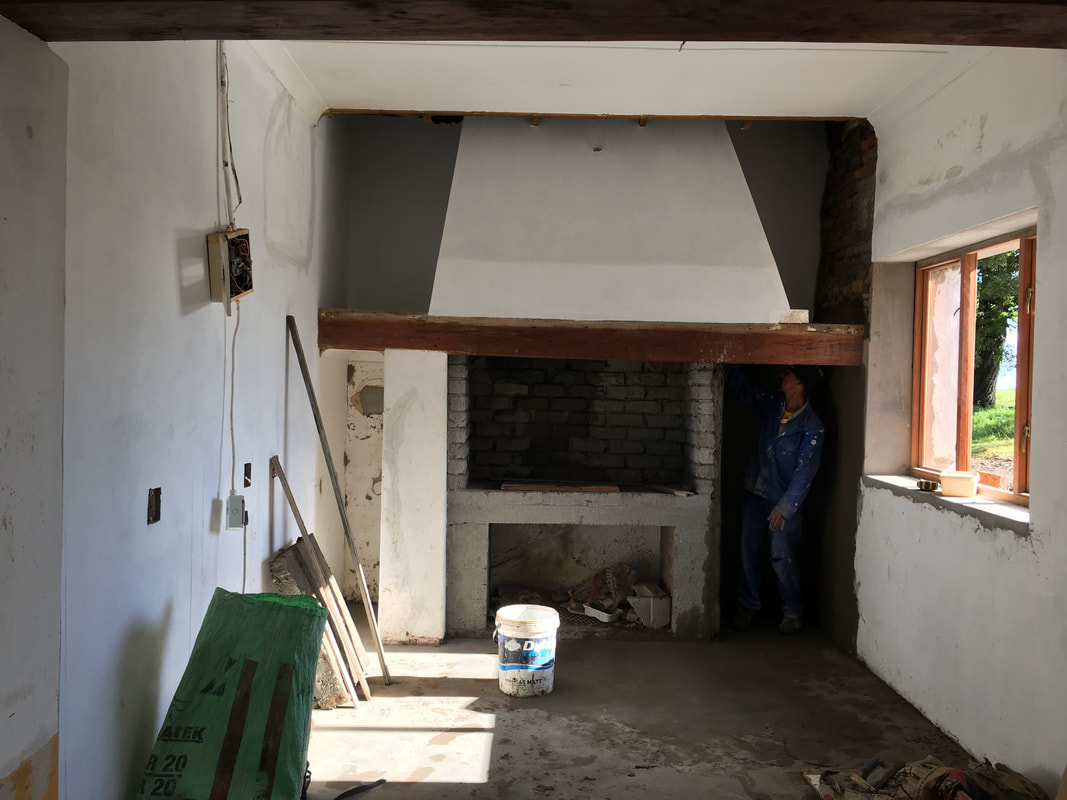 Building the new kitchen around the original fireplace 